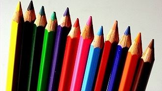 Colored pencils in a row.